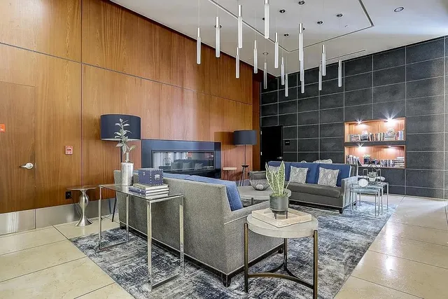 a dining room with furniture and window