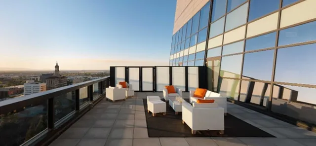 a view of a hallway with wooden shelves