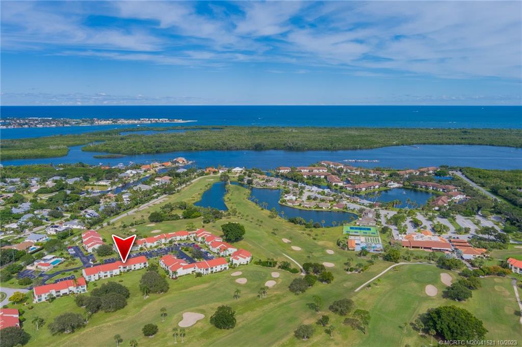 5433 Southeast Miles Grant Road, Unit 203 Stuart, FL 34997 - Photo 1 of 31 a view of city and ocean