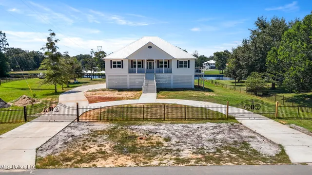 $875,000 | 13215 River Walk Circle, D'Iberville, MS 39540