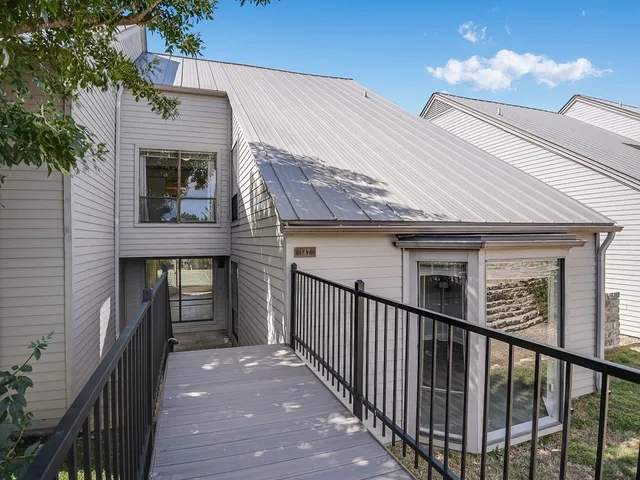 a view of a balcony and a window