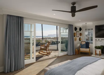 a bedroom with furniture a ceiling fan and a flat screen tv