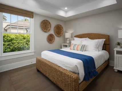 a bathroom with a sink a mirror and a shower