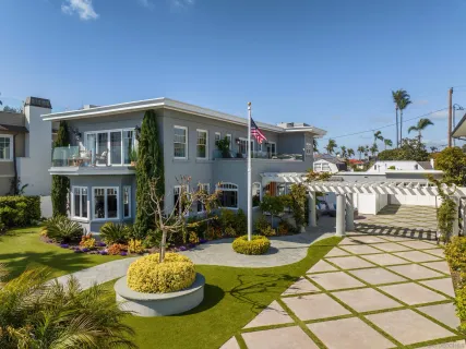 a front view of a house with swimming pool