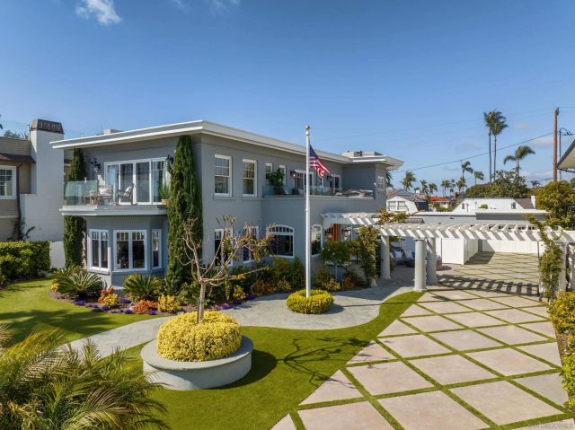 a front view of a house with swimming pool