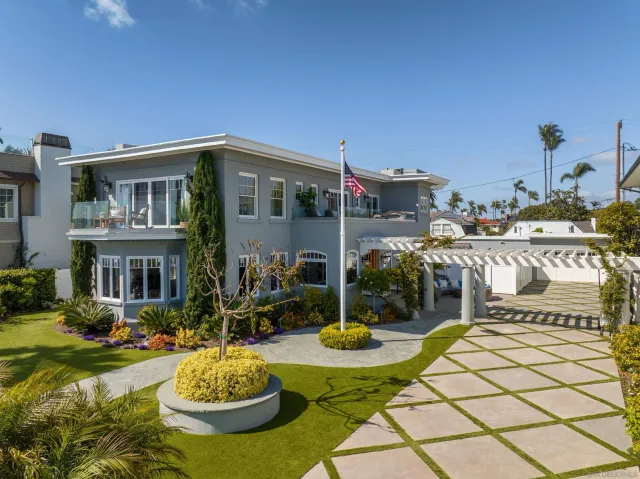 a front view of a house with swimming pool