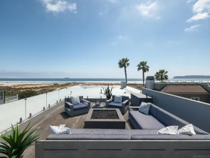 a view of a swimming pool with an outdoor seating