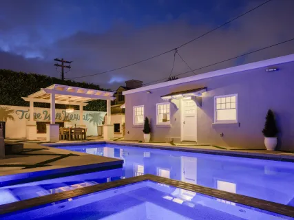 a outdoor space with furniture and a fireplace