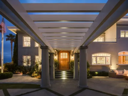 a view of living room with furniture and chandelier