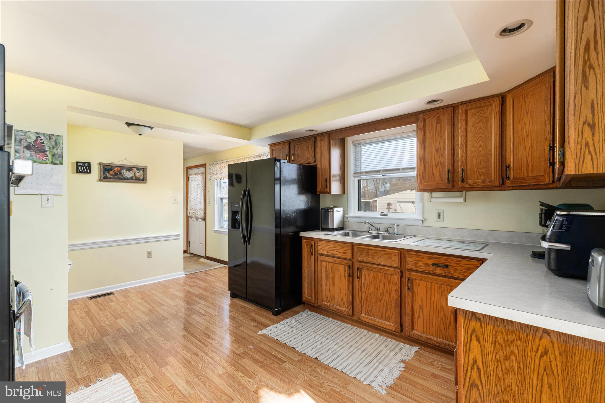 2467 Buck Hill Road Mount Jackson, VA 22842 - Photo 13 of 45 a kitchen with stainless steel appliances granite countertop a refrigerator sink and cabinets
