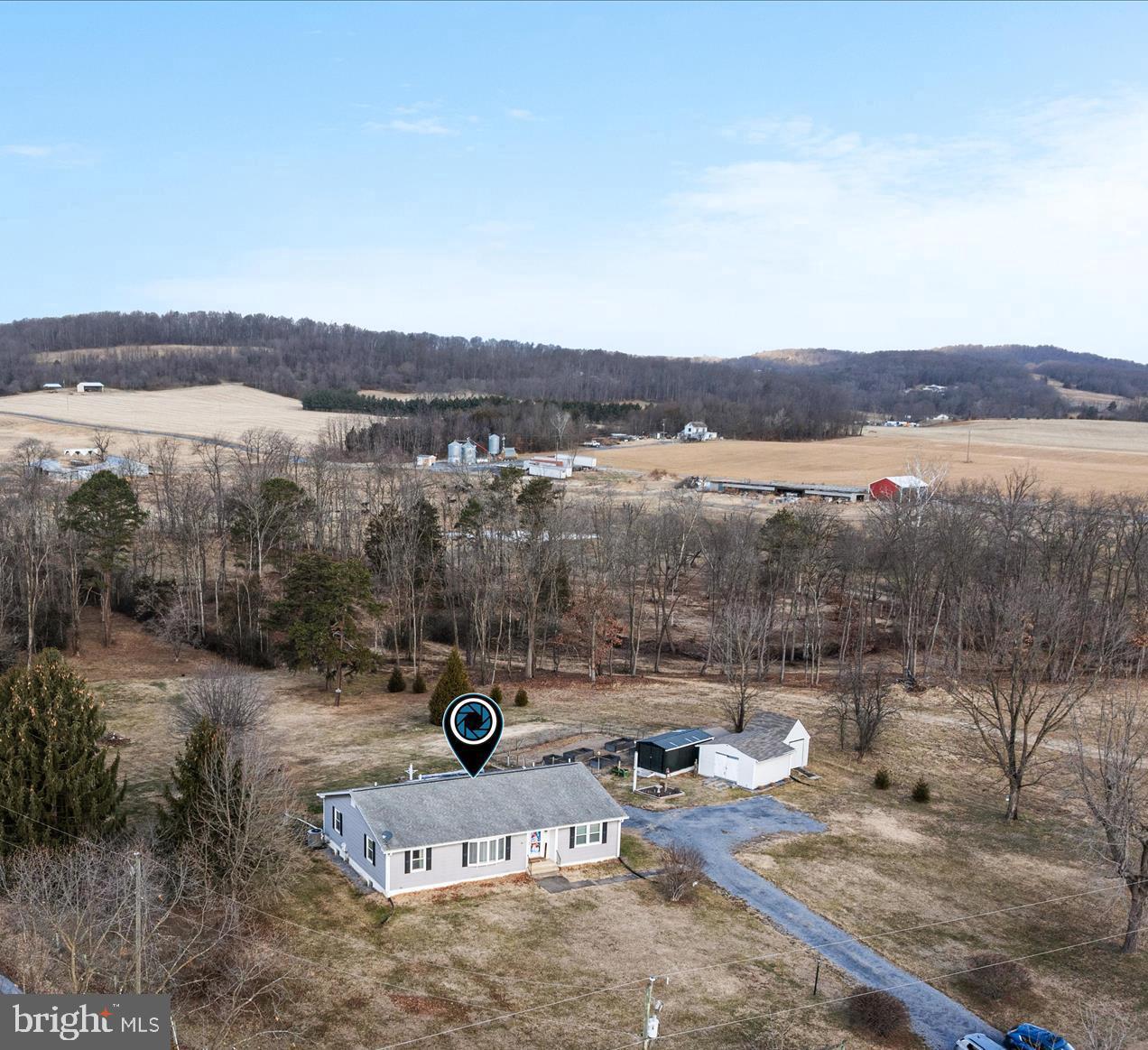 2467 Buck Hill Road Mount Jackson, VA 22842 - Photo 2 of 45 a view of a lake with a mountain
