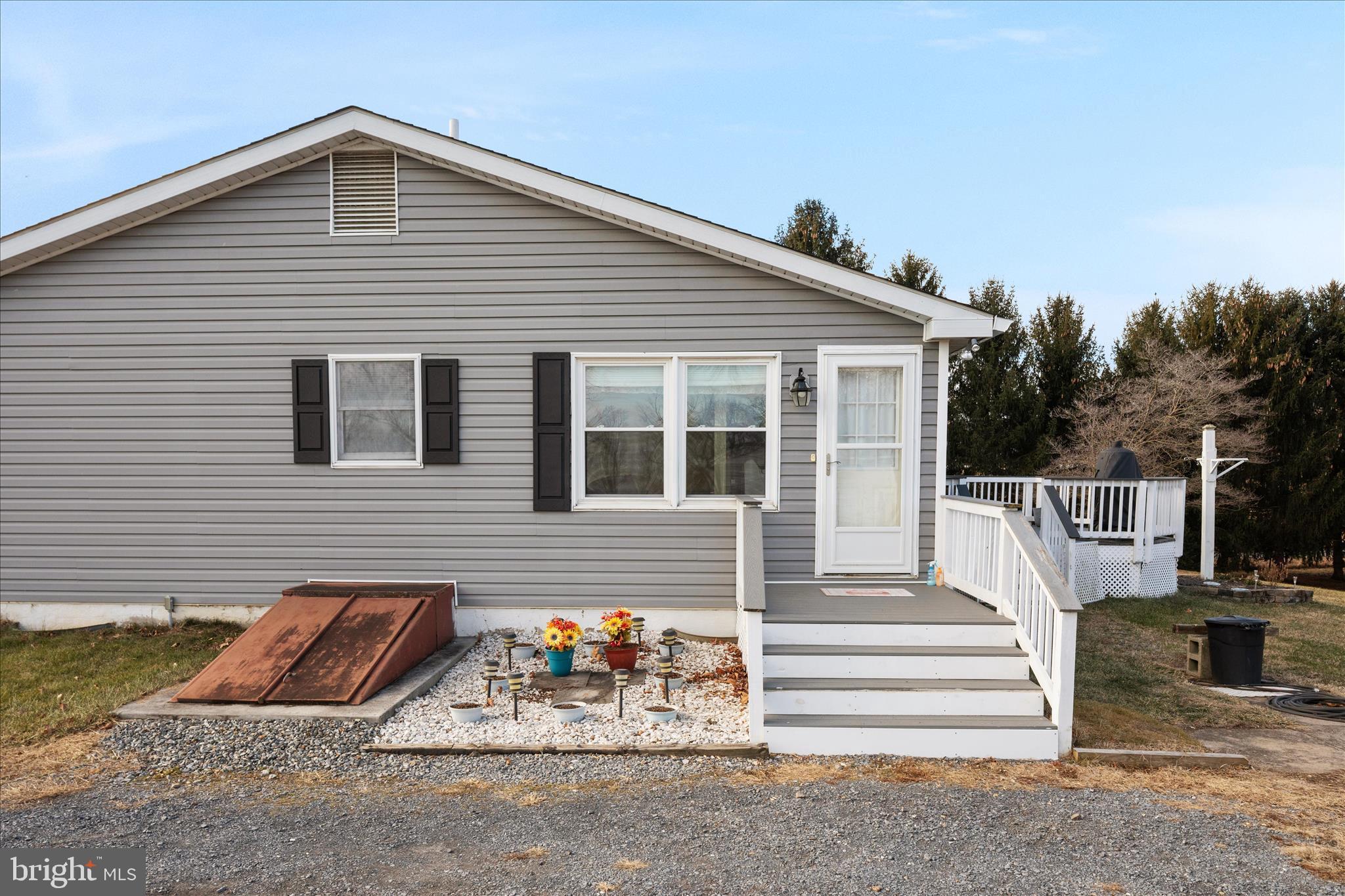 2467 Buck Hill Road Mount Jackson, VA 22842 - Photo 32 of 45 a view of a house with a yard and seating area