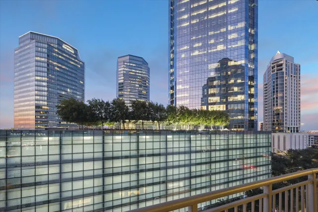 a view of a balcony with a street