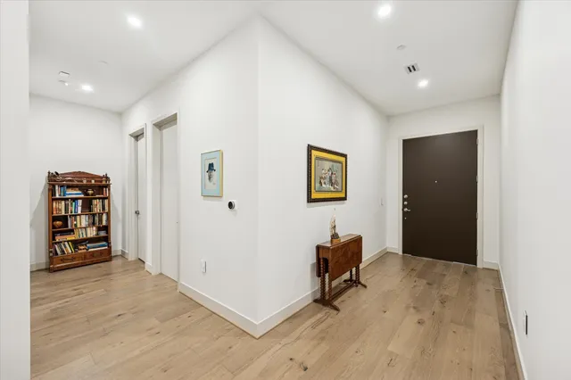 a view of a hallway with workspace