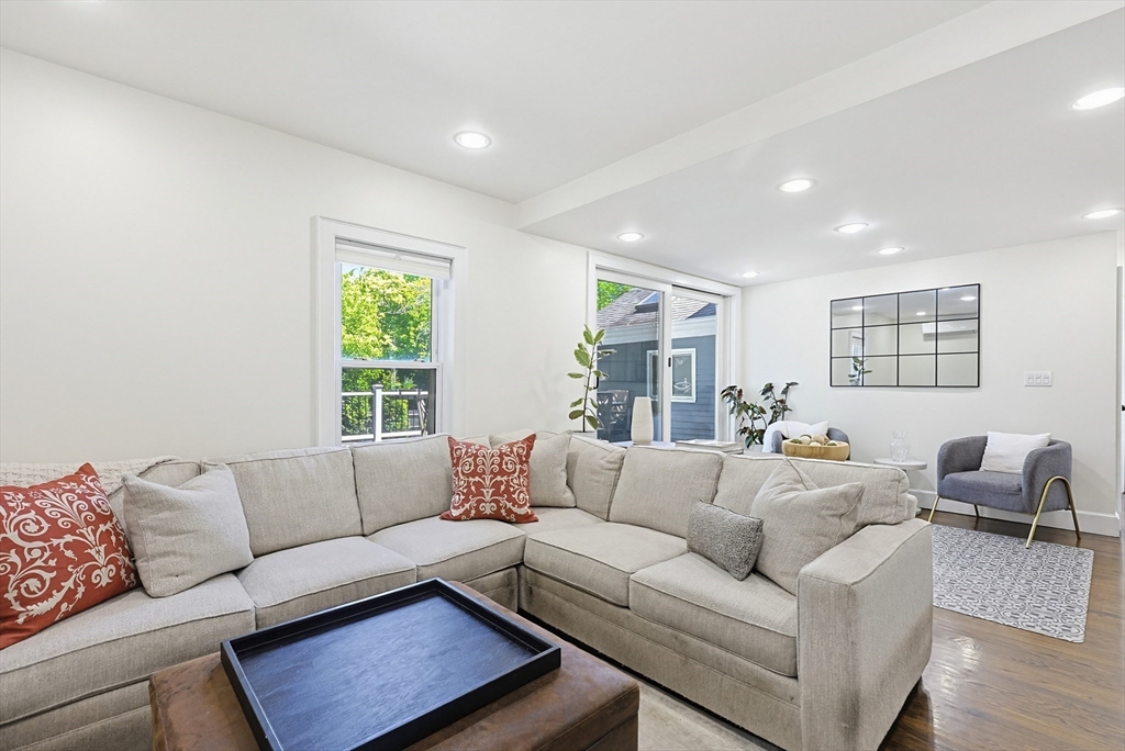 345 Sherman Street Canton, MA 02021 - Photo 5 of 42 a living room with furniture and a large window