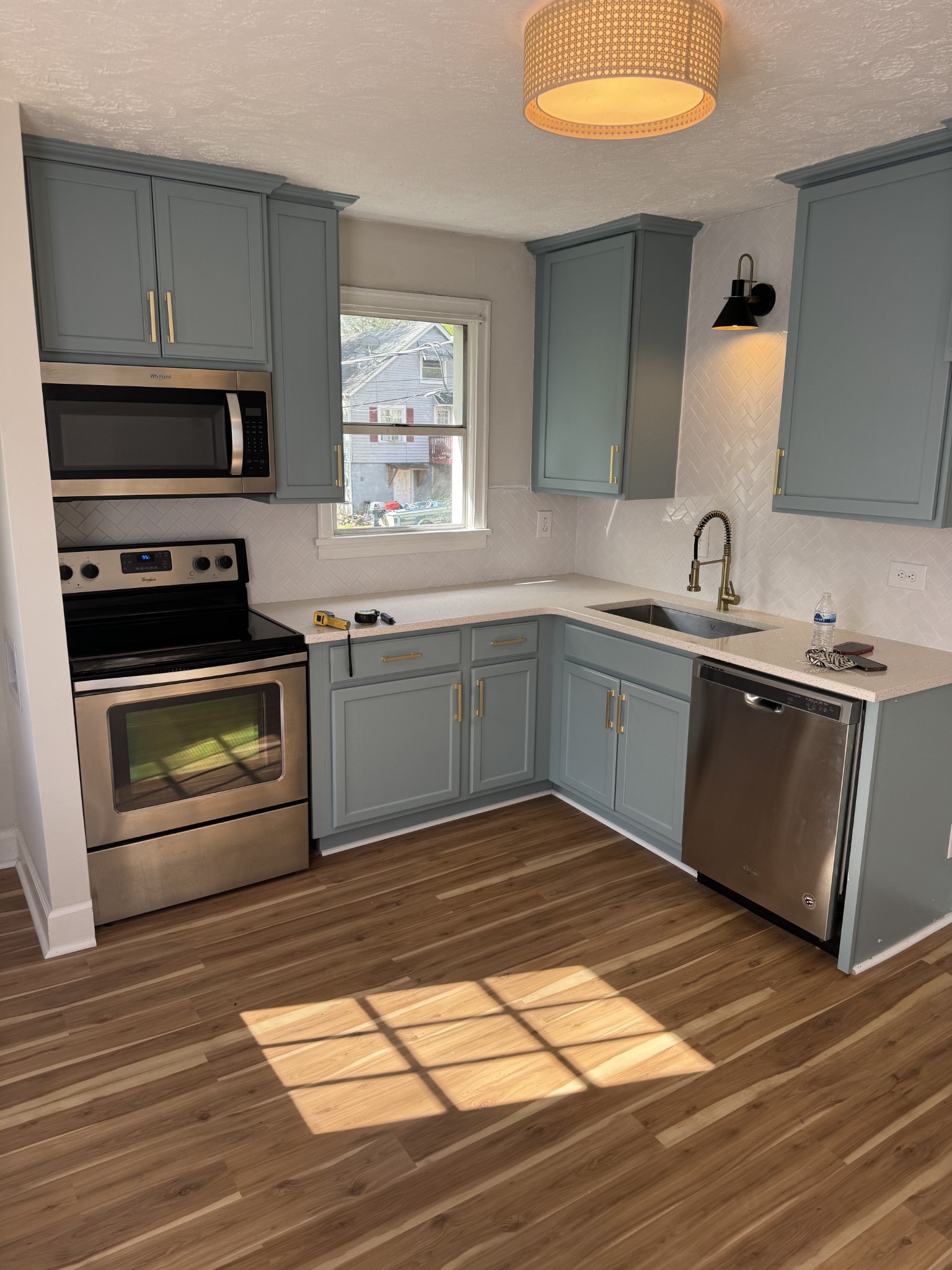 1210 Daniel Street Clarksville, TN 37040 - Photo 4 of 5 a kitchen with stainless steel appliances granite countertop a sink stove and cabinets