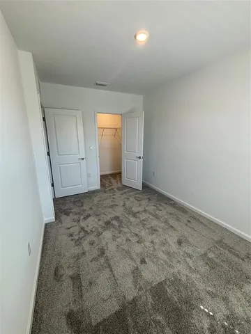 an empty room with a natural light