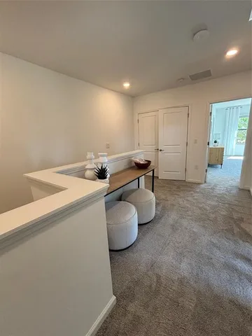 a kitchen with a sink and a stove top oven