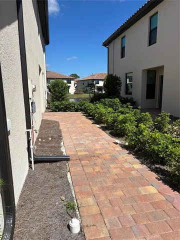 a view of a pathway with a house