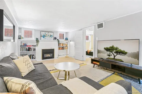 a view of a dining room with furniture wooden floor and a carpet