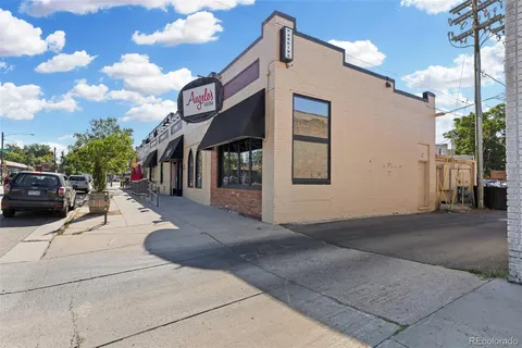 a view of a building with a street
