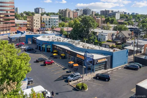a view of a house with roof deck front of house