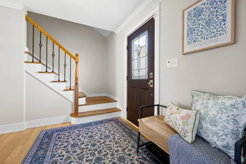 a living room with furniture and a rug