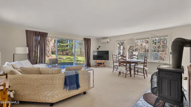 a bedroom with a bed and a lamp