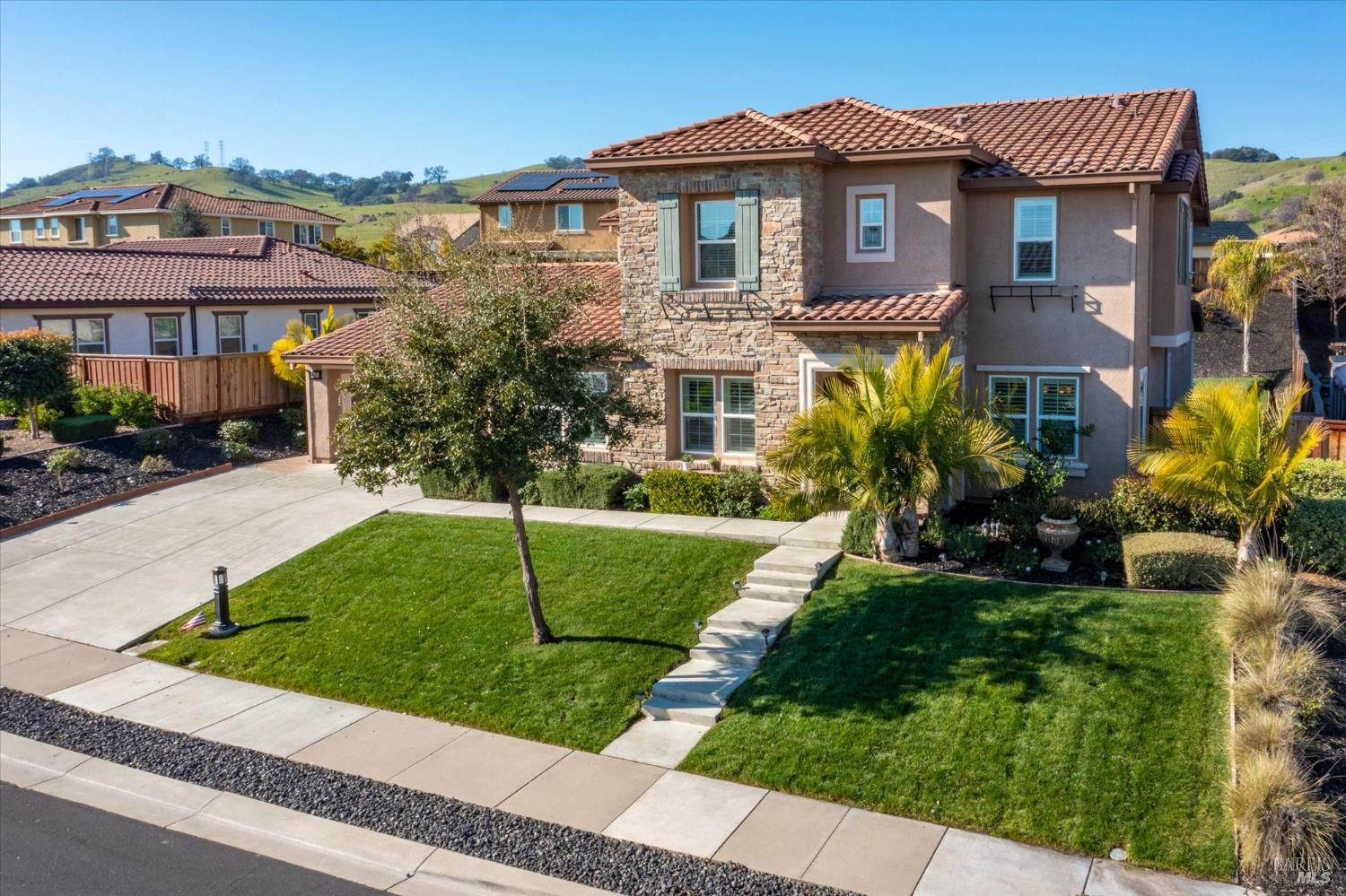 685 Elderberry Loop Vacaville, CA 95688 - Photo 2 of 73 a front view of a house with a yard