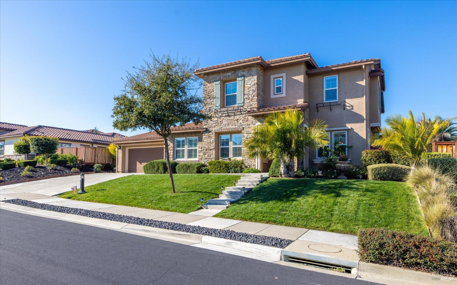 685 Elderberry Loop Vacaville, CA 95688 - Photo 3 of 73 a front view of house with yard and green space