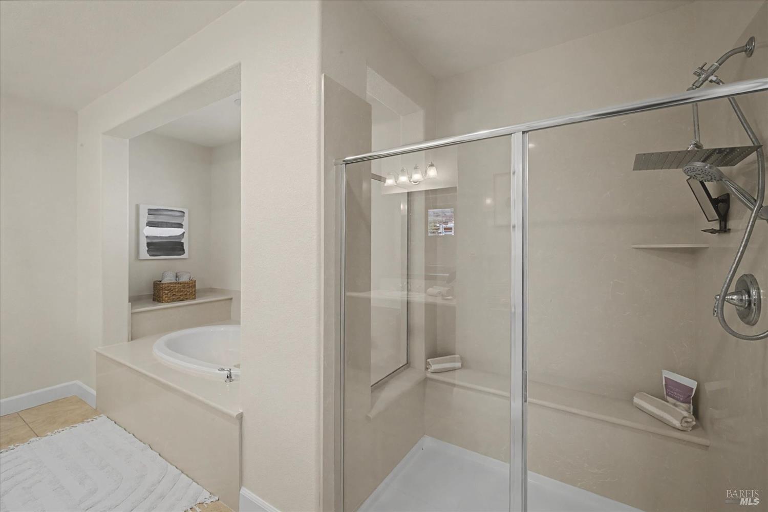 685 Elderberry Loop Vacaville, CA 95688 - Photo 52 of 73 a bathroom that has a glass shower door