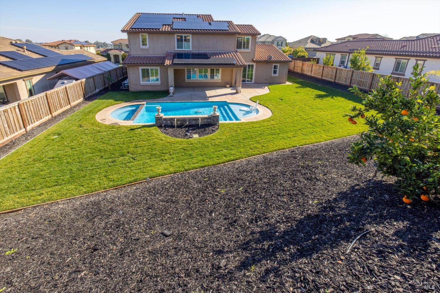 685 Elderberry Loop Vacaville, CA 95688 - Photo 64 of 73 a view of a house with a big yard and large trees