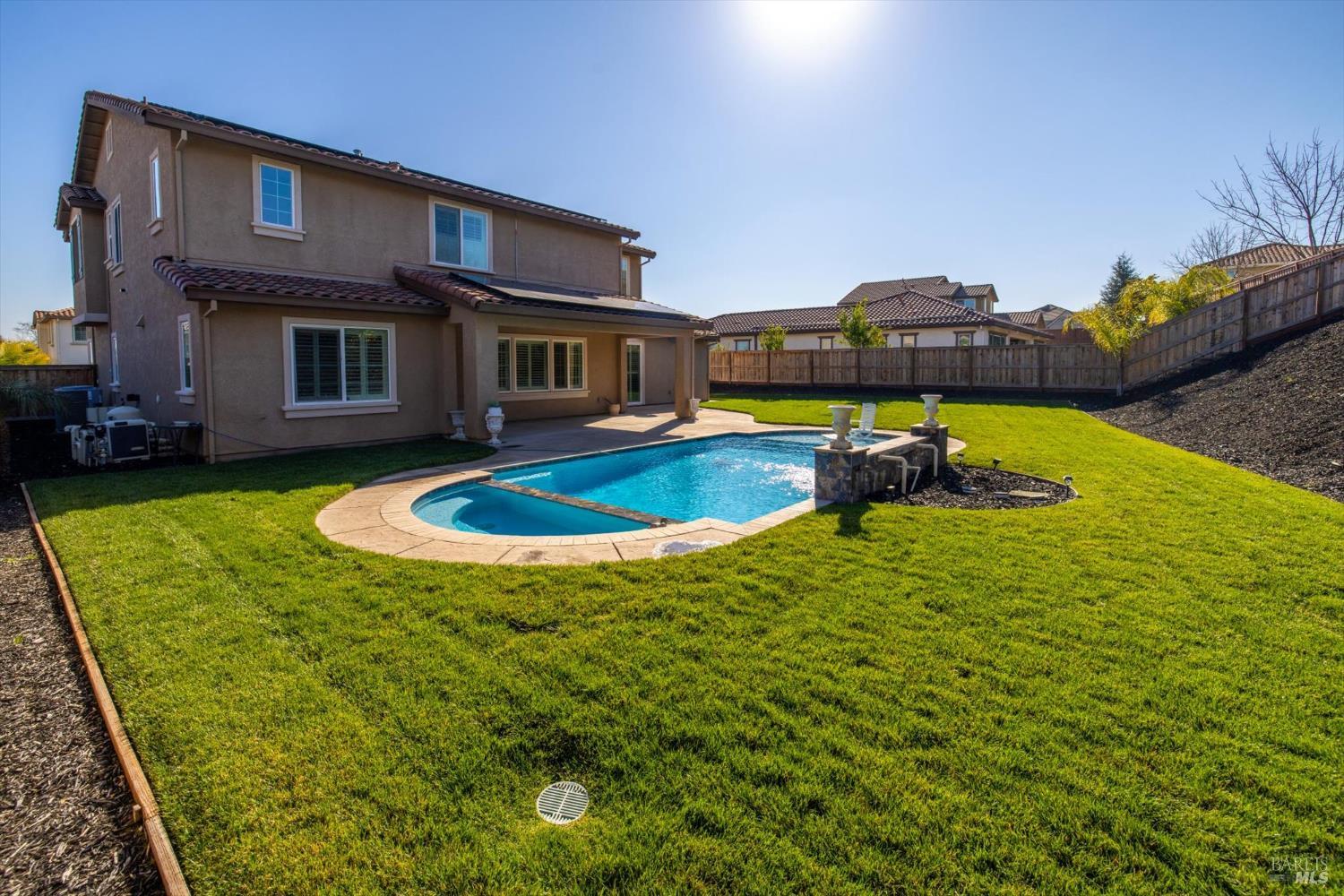 685 Elderberry Loop Vacaville, CA 95688 - Photo 66 of 73 a view of a house with pool and chairs