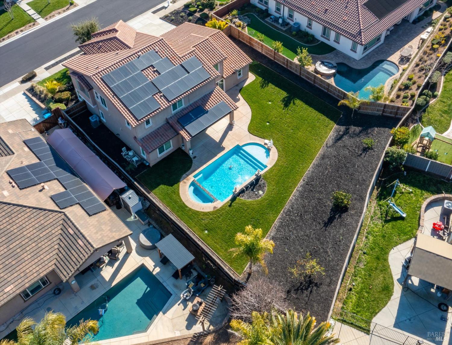 685 Elderberry Loop Vacaville, CA 95688 - Photo 70 of 73 a aerial view of a house with a garden