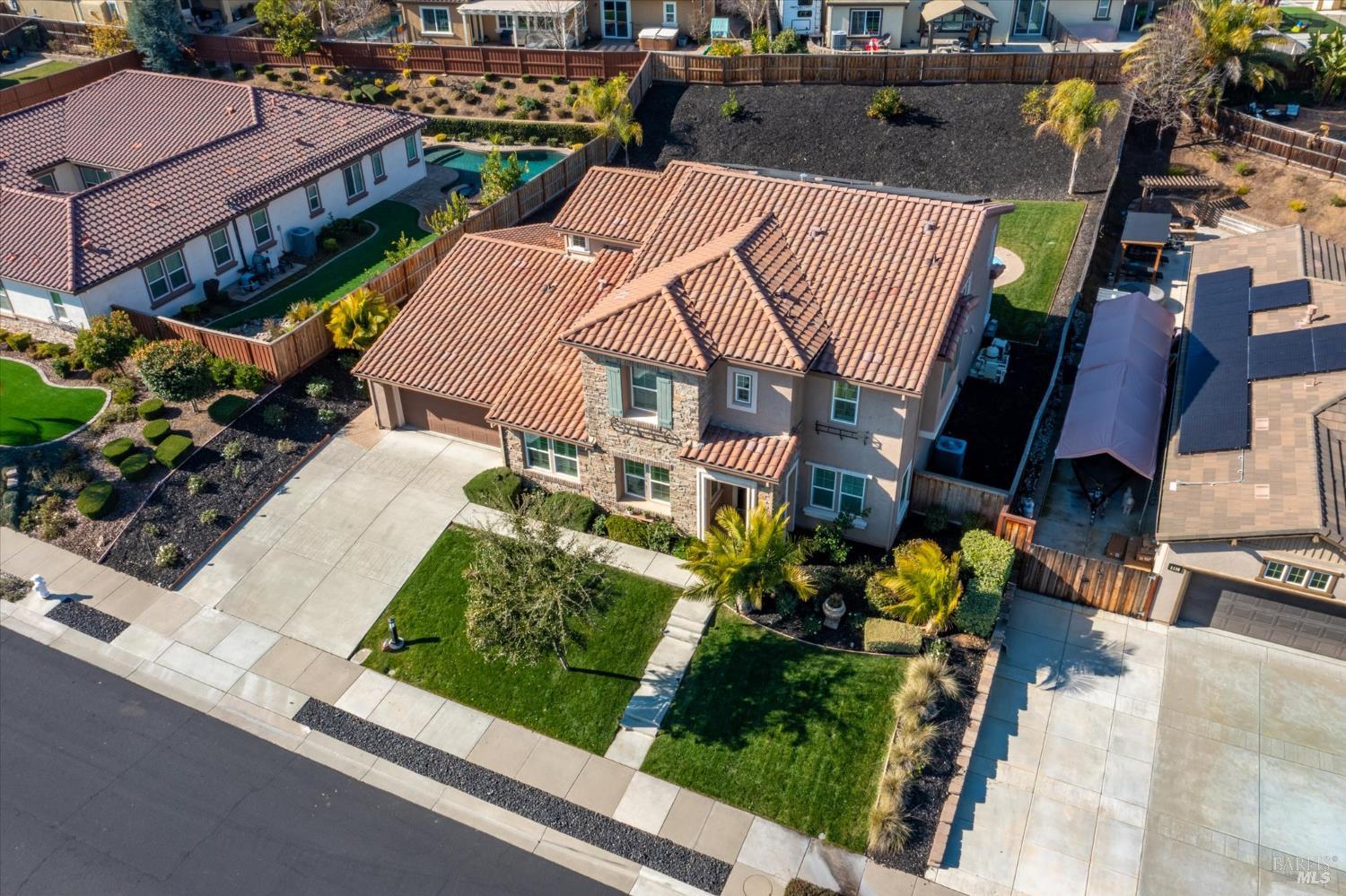 685 Elderberry Loop Vacaville, CA 95688 - Photo 73 of 73 an aerial view of a house with a garden and plants