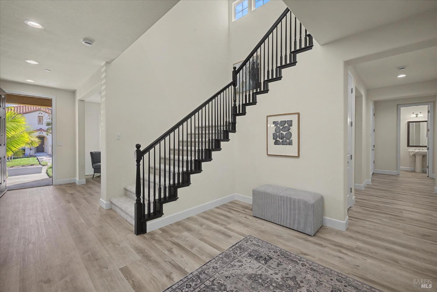 685 Elderberry Loop Vacaville, CA 95688 - Photo 9 of 73 a view of staircase with wooden floor and stairs