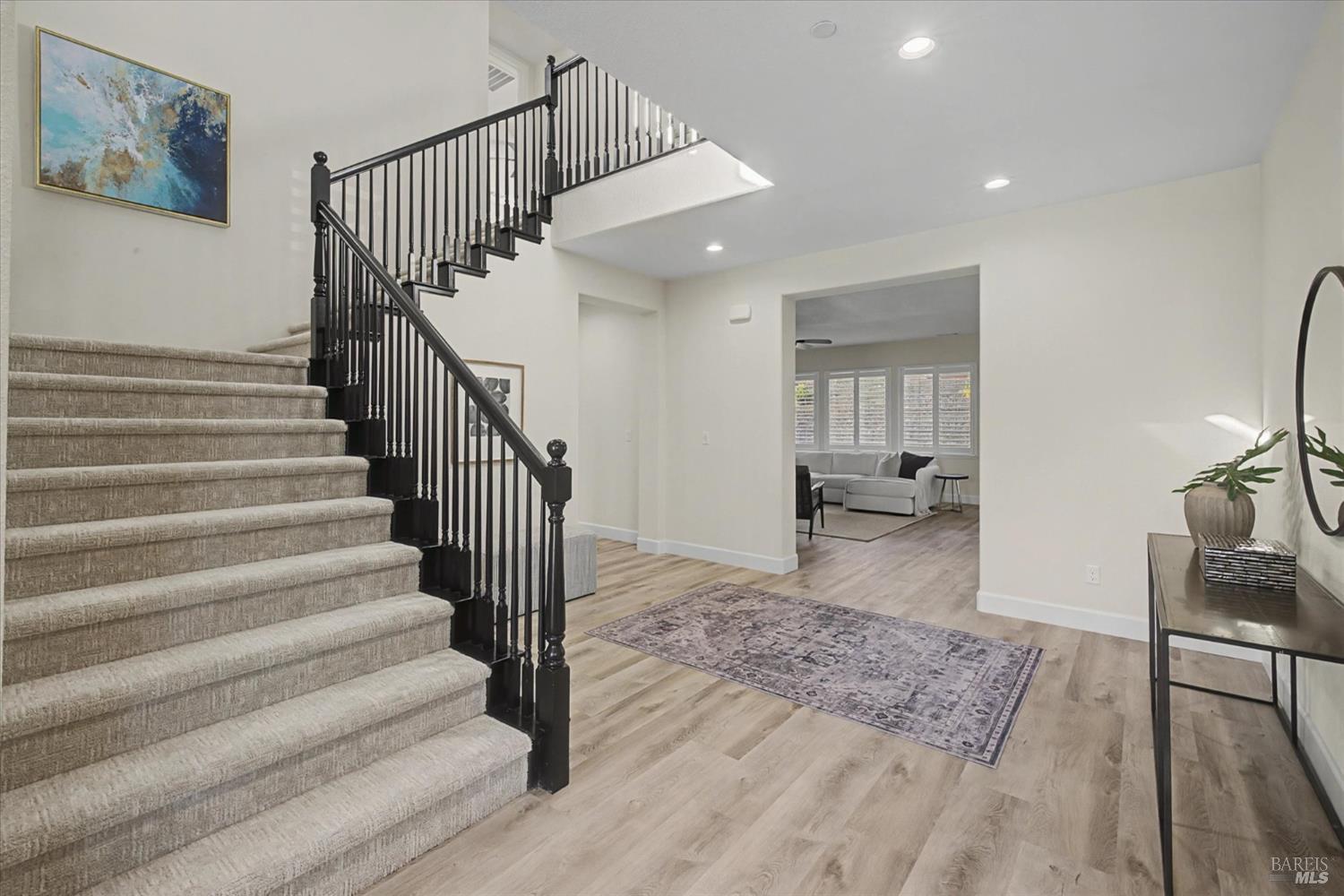 685 Elderberry Loop Vacaville, CA 95688 - Photo 10 of 73 a view of entryway and hall with wooden floor
