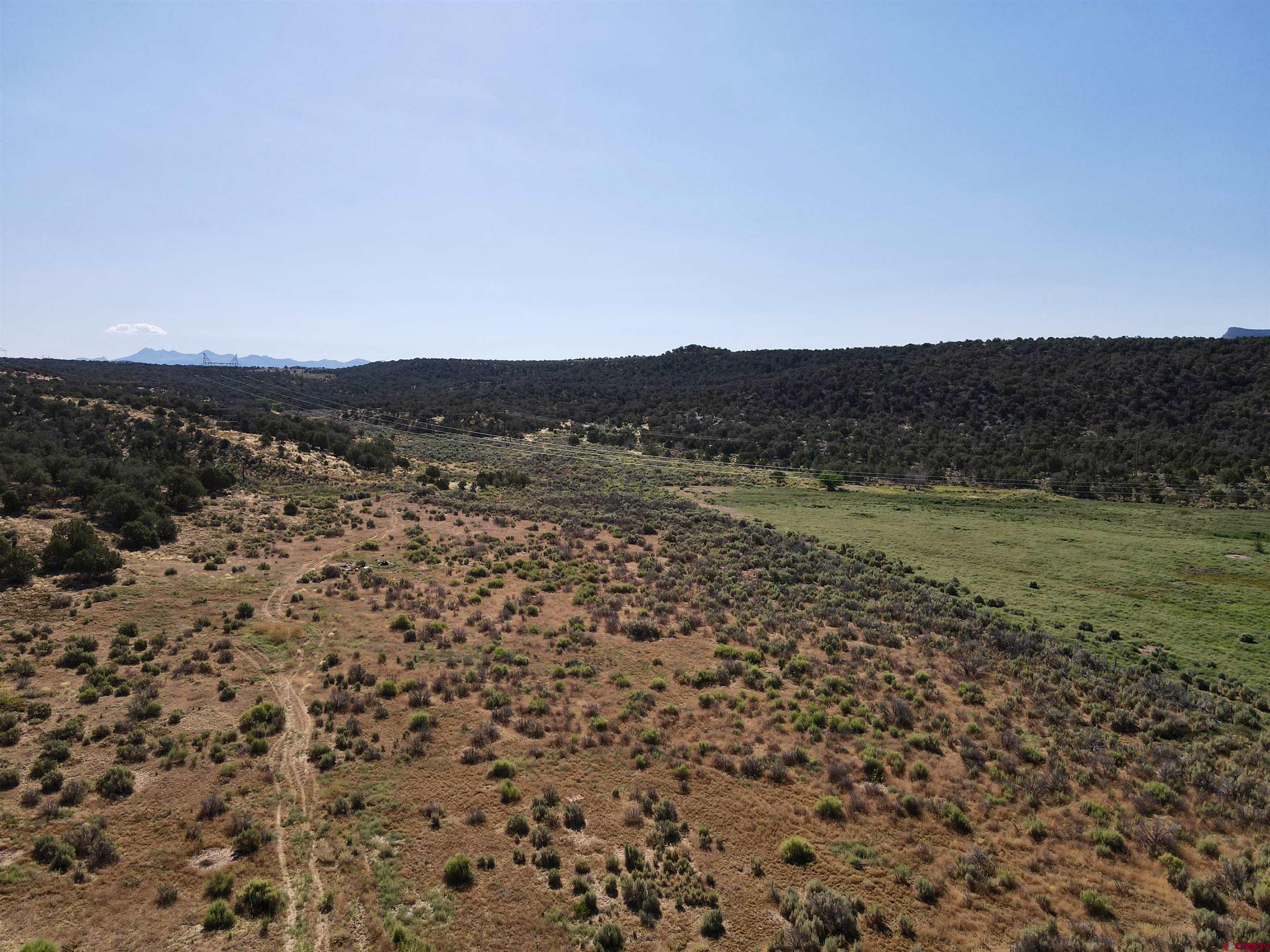 Tbd Rd L Mancos, CO 81328 - Photo 5 of 24 a view of lake with mountain