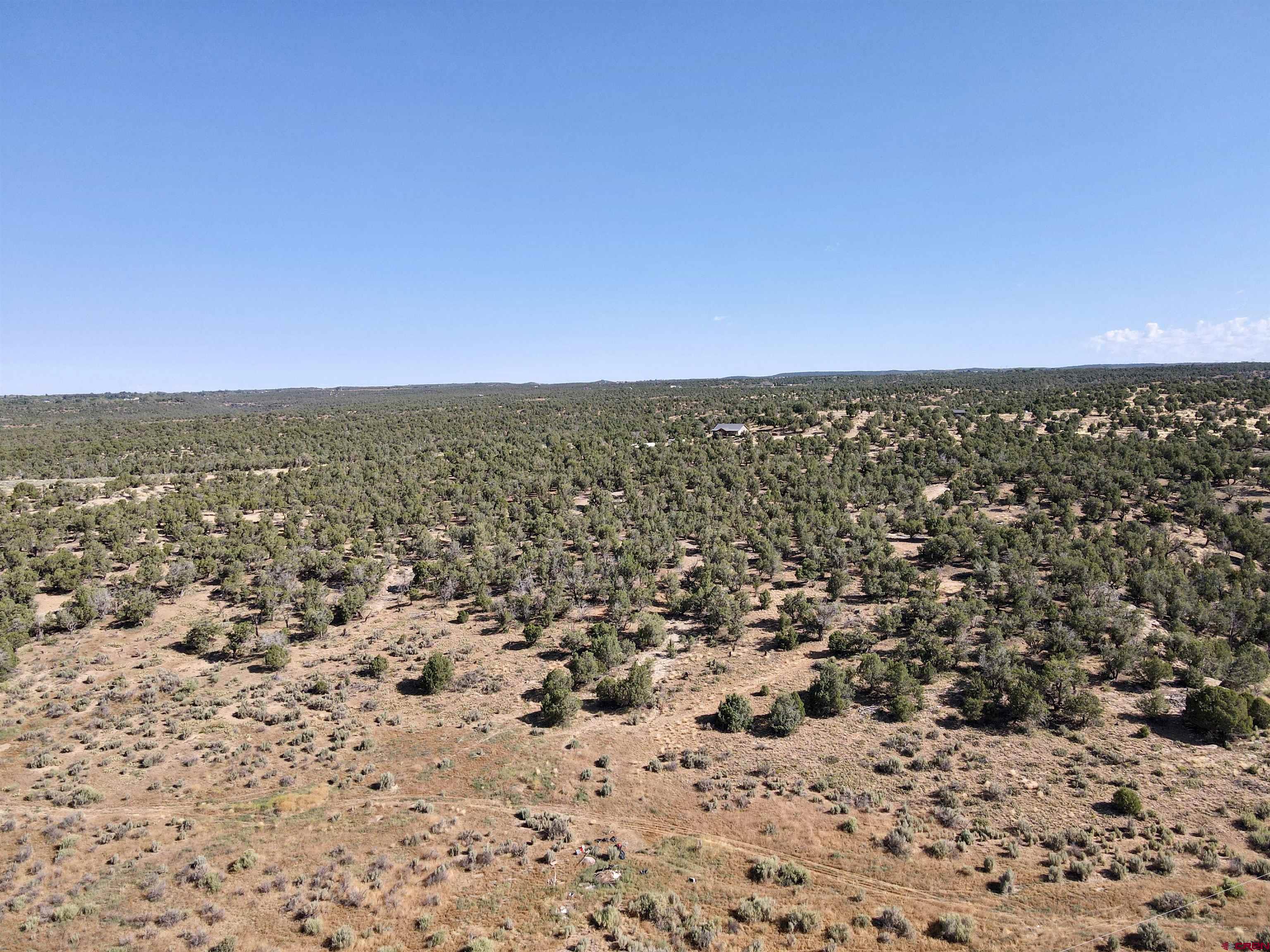 Tbd Rd L Mancos, CO 81328 - Photo 9 of 24 an aerial view of residential houses with outdoor space
