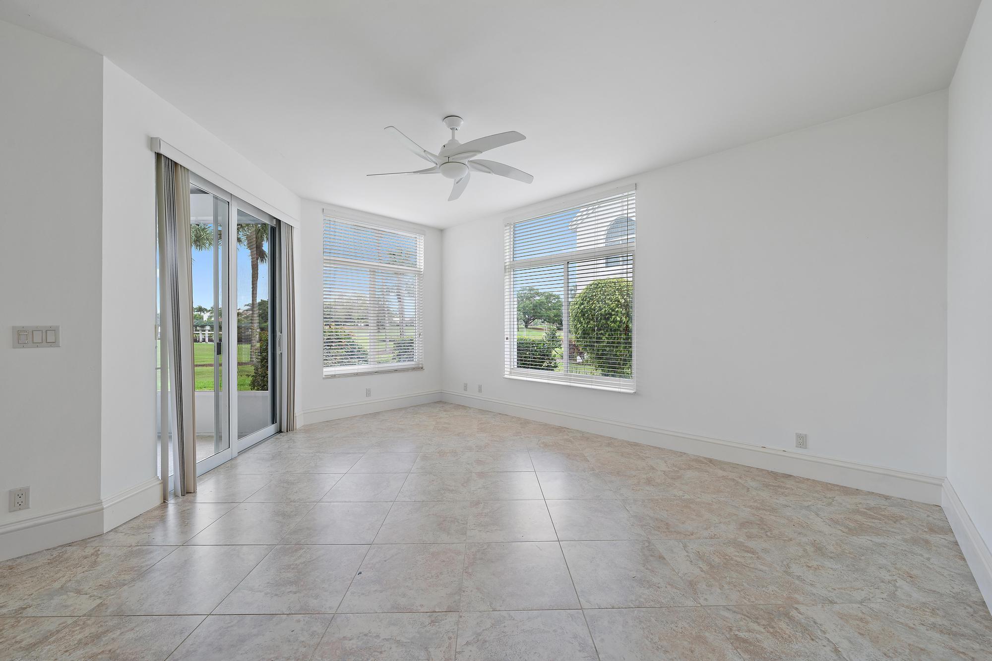 1504 Captains Way Jupiter, FL 33477 - Photo 13 of 51 a view of an empty room with a window
