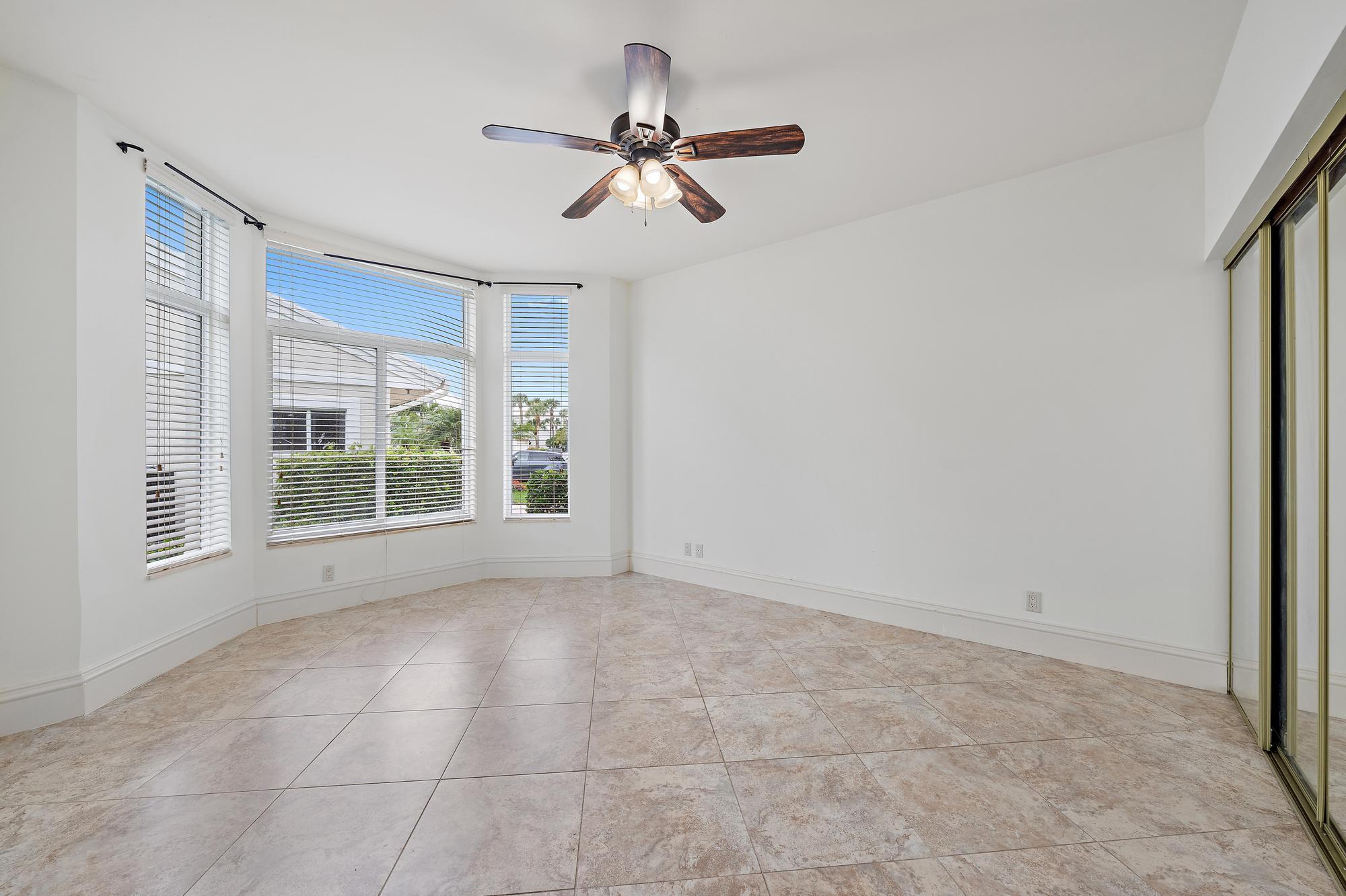 1504 Captains Way Jupiter, FL 33477 - Photo 15 of 51 a view of an empty room with a window