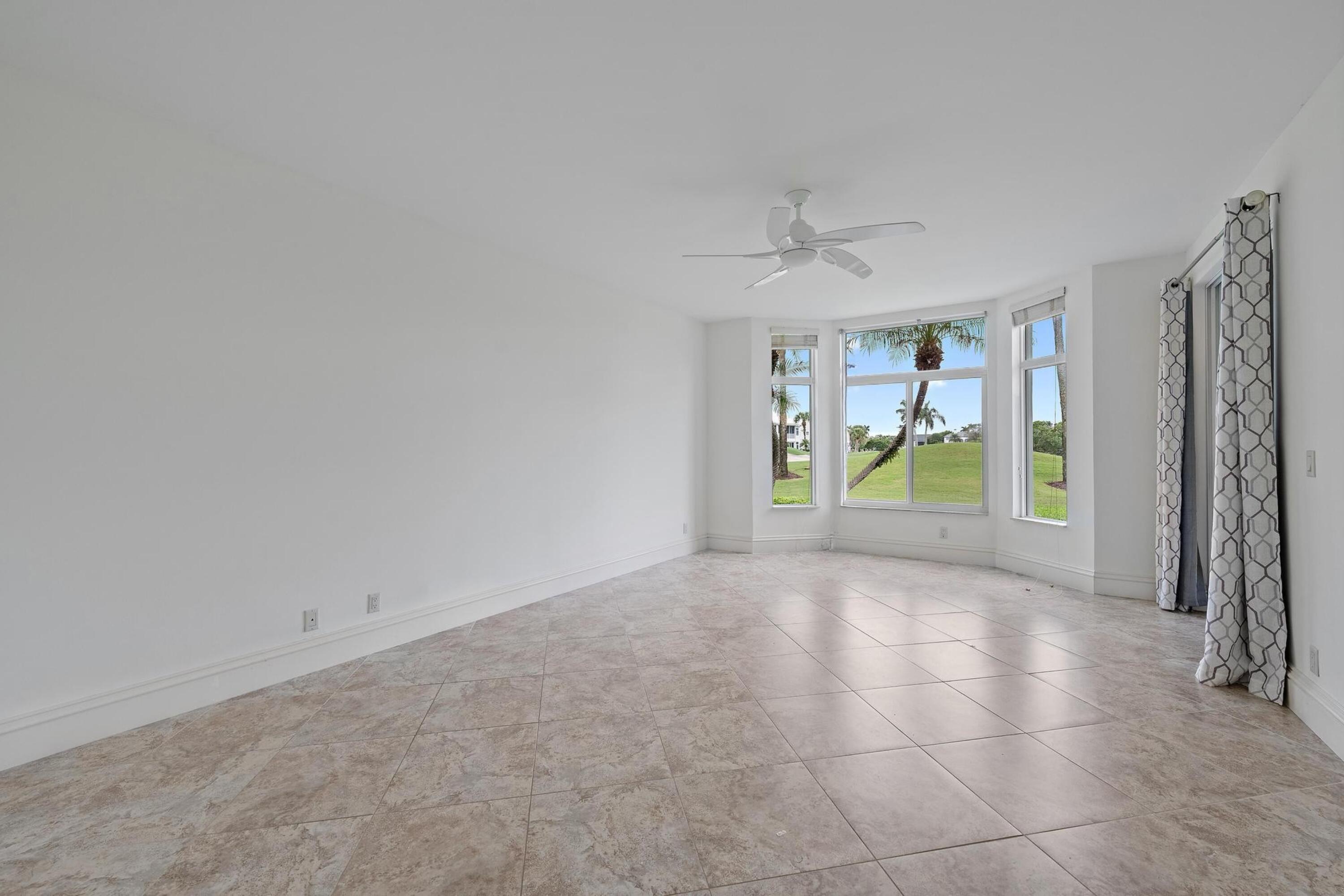 1504 Captains Way Jupiter, FL 33477 - Photo 19 of 51 a view of an empty room with a window