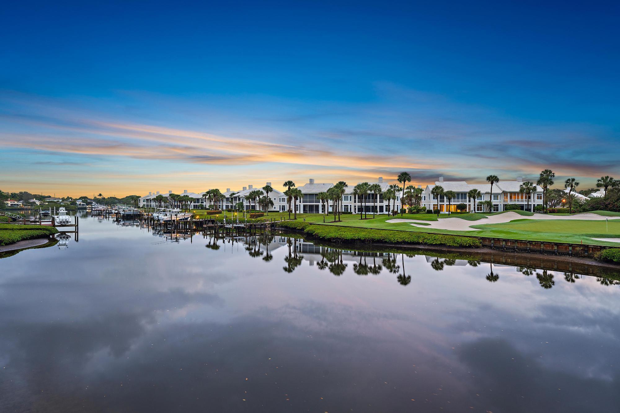 1504 Captains Way Jupiter, FL 33477 - Photo 28 of 51 a view of a lake with houses