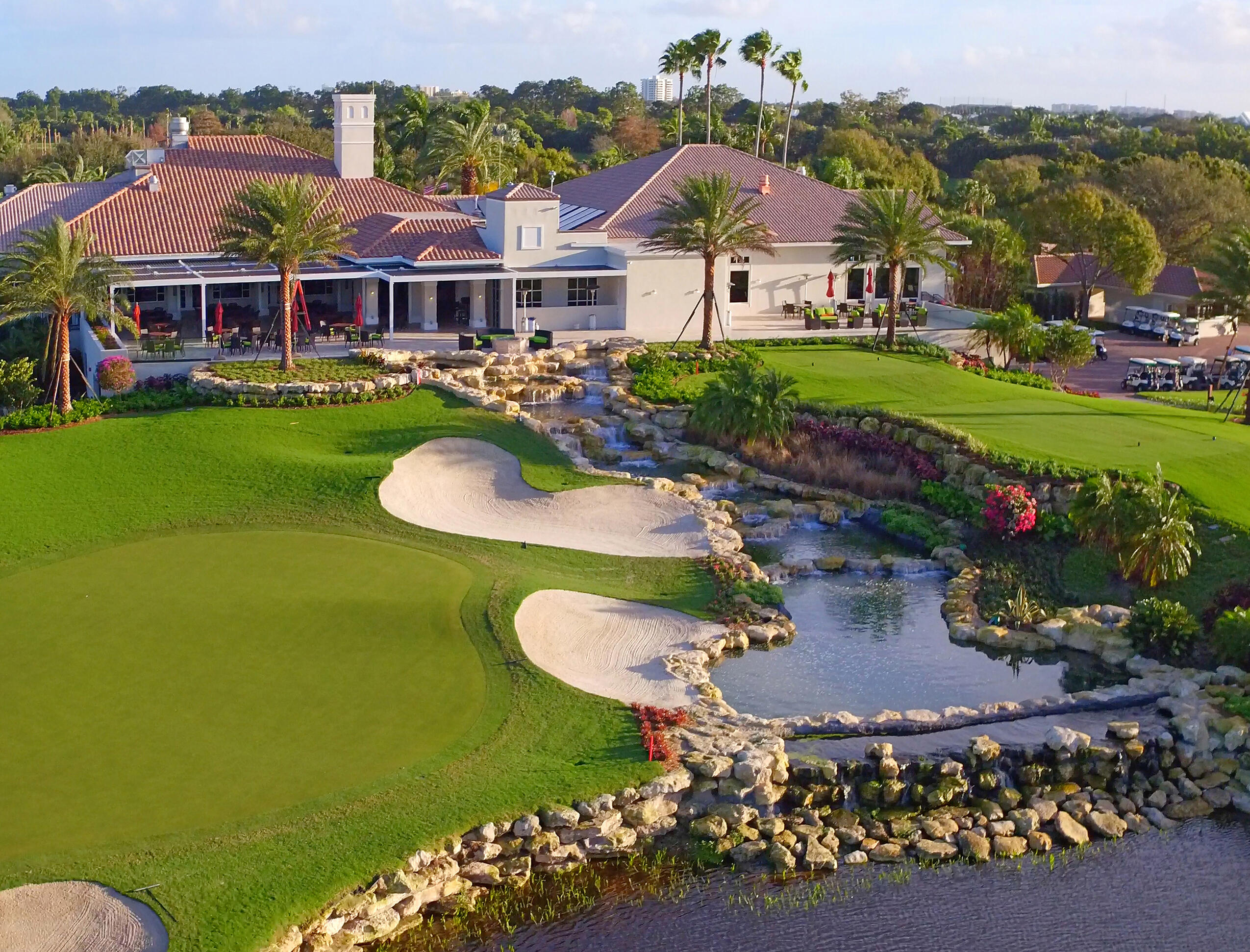 1504 Captains Way Jupiter, FL 33477 - Photo 51 of 51 an aerial view of a house with a garden and lake view