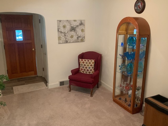 703 North 12th Street Rochelle, IL 61068 - Photo 4 of 37 a living room with furniture and a window