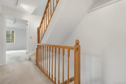 a view of hallway with stairs