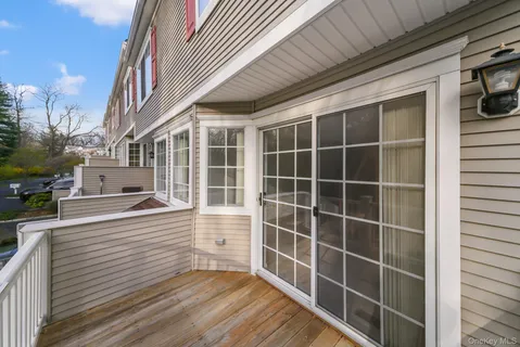 a view of a house with a large window