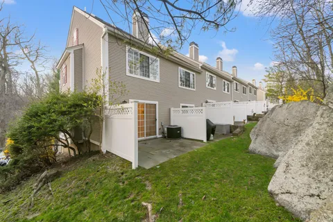 a view of a back yard of the house