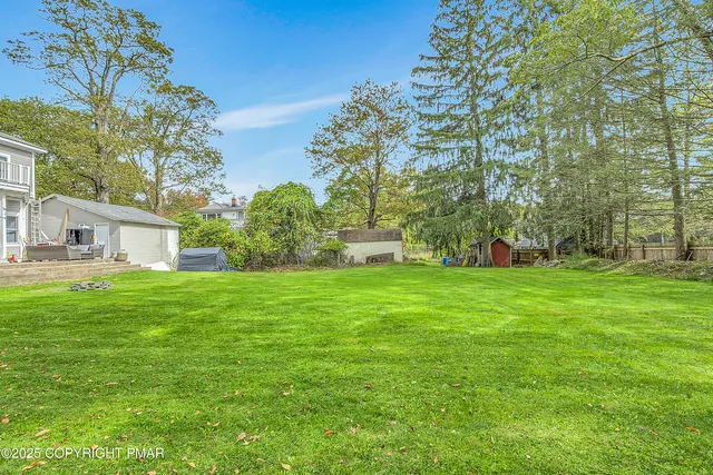 a backyard of a house with seating space