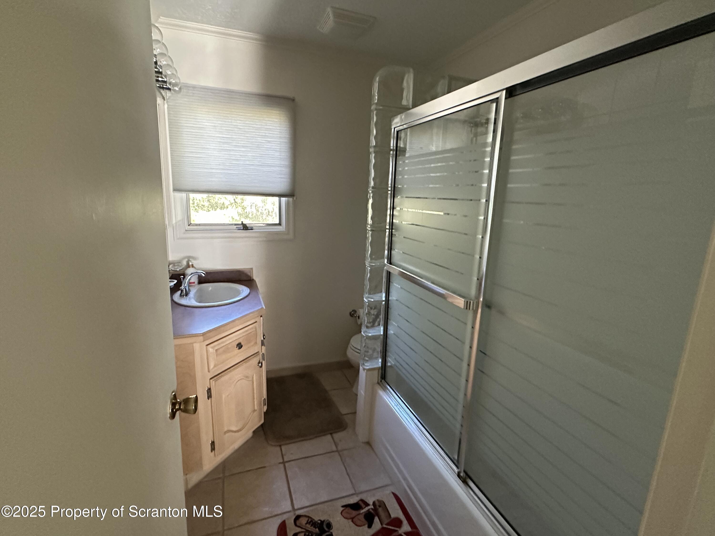25 Fall Place Union Dale, PA 18470 - Photo 15 of 27 a bathroom with a sink and a toilet